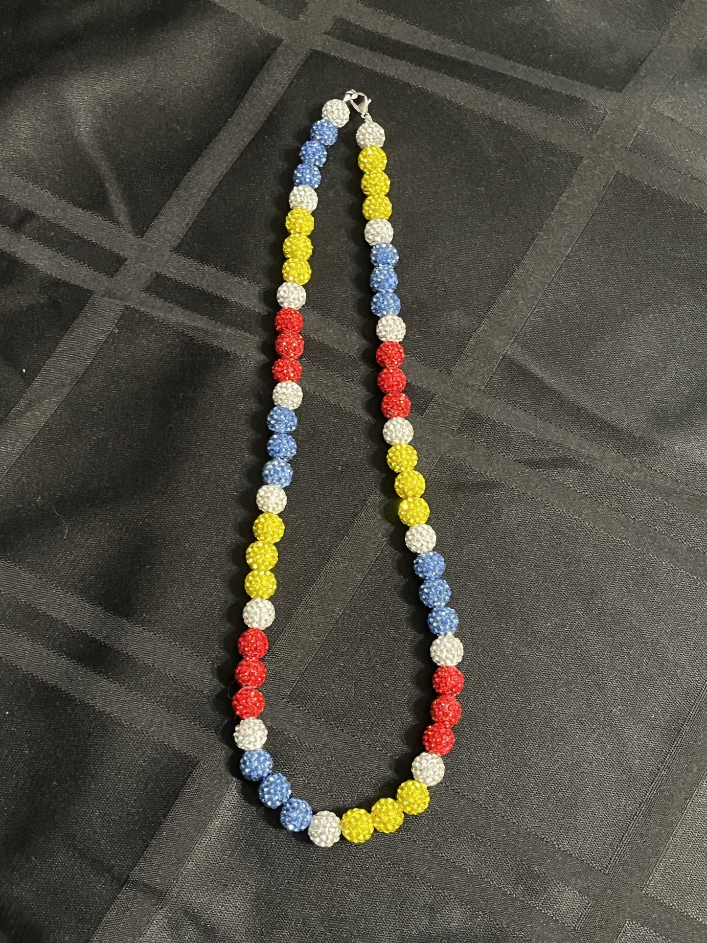 red white yellow blue beaded necklace