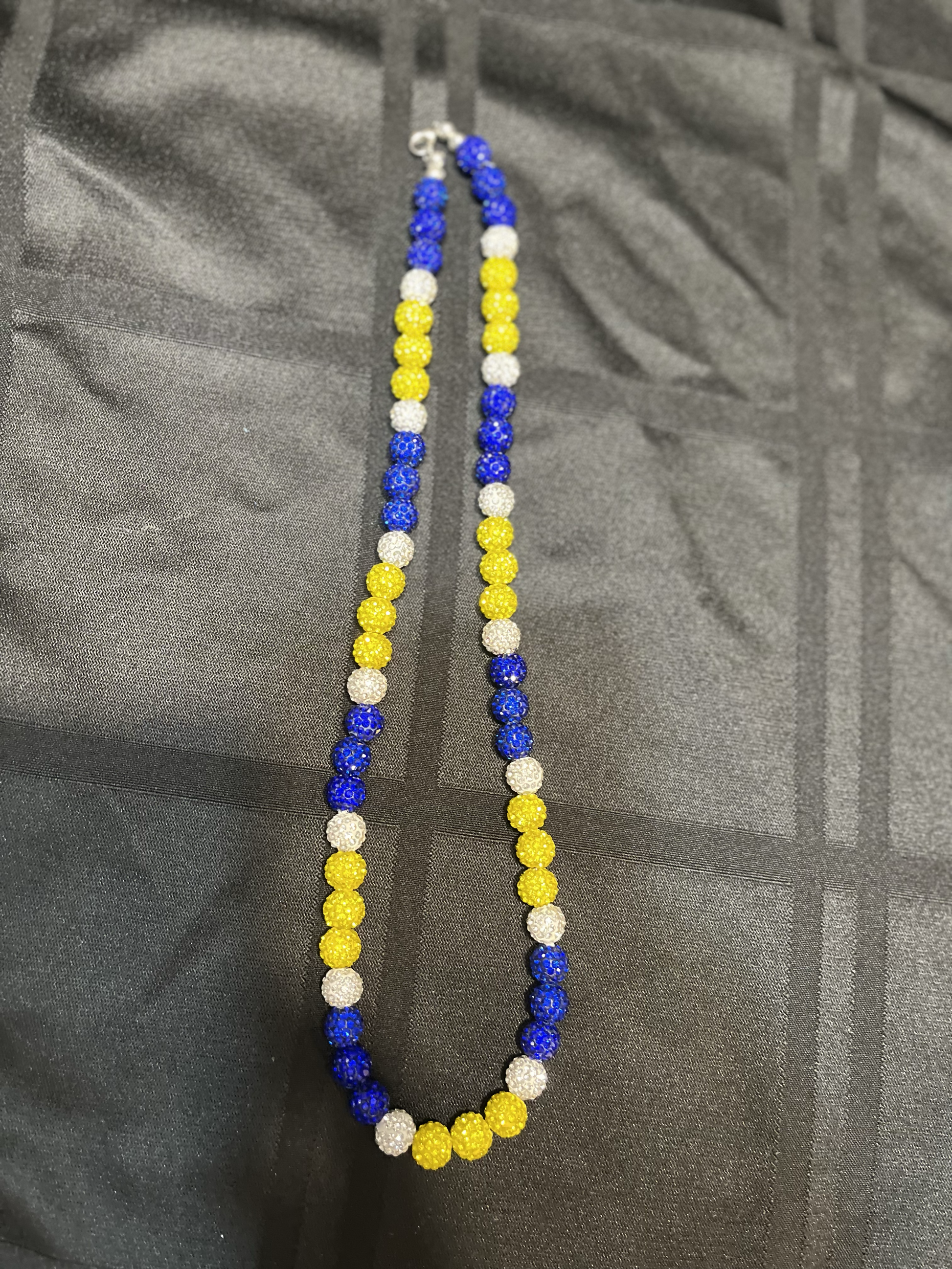 blue yellow and white beaded necklace